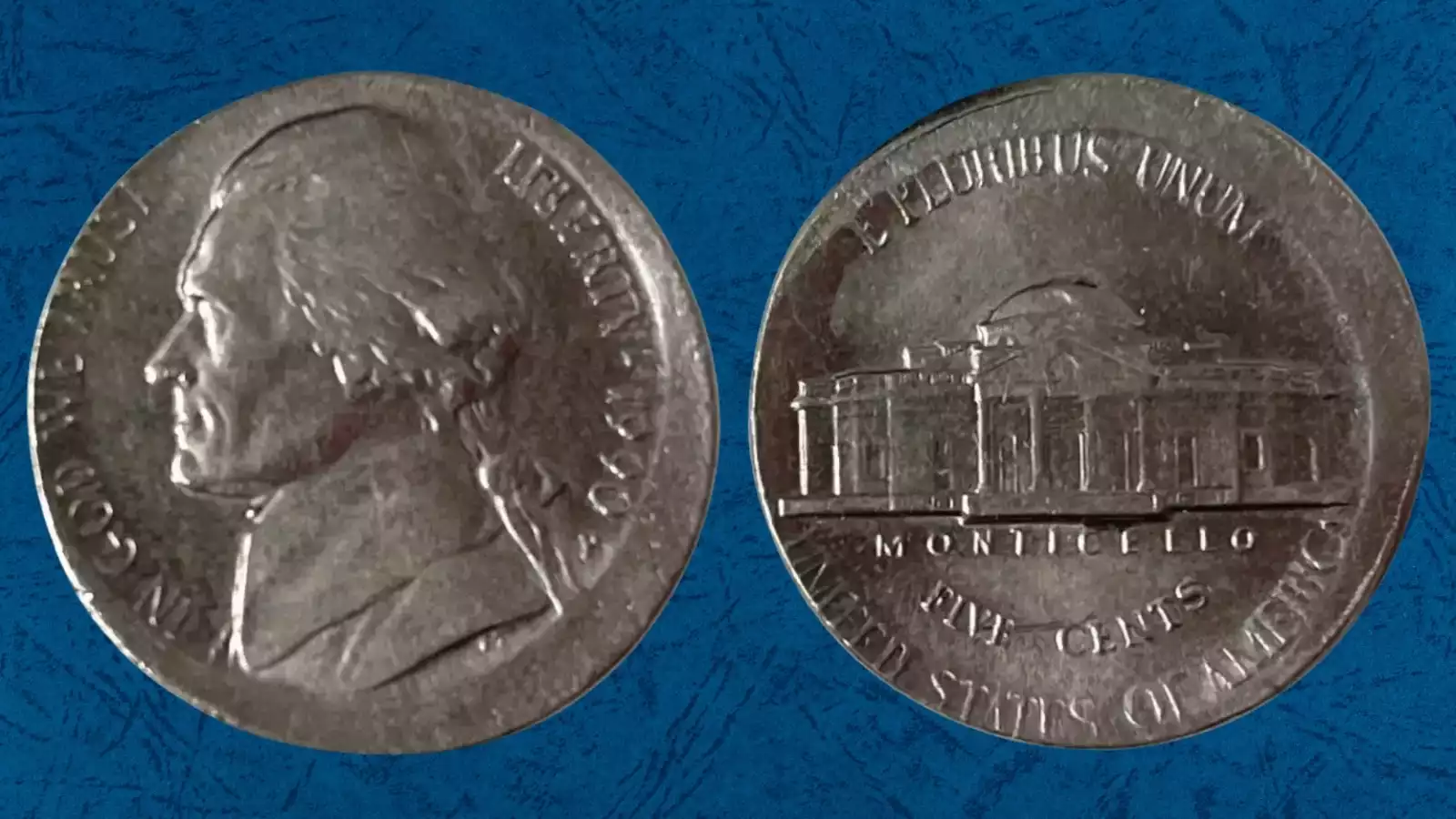 1990 nickel off-center strike error — crescent-shaped unstruck area with date fully visible, approximately 20–40% off center
